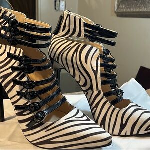 SCENE 3”-4 inch Zebra print heels.